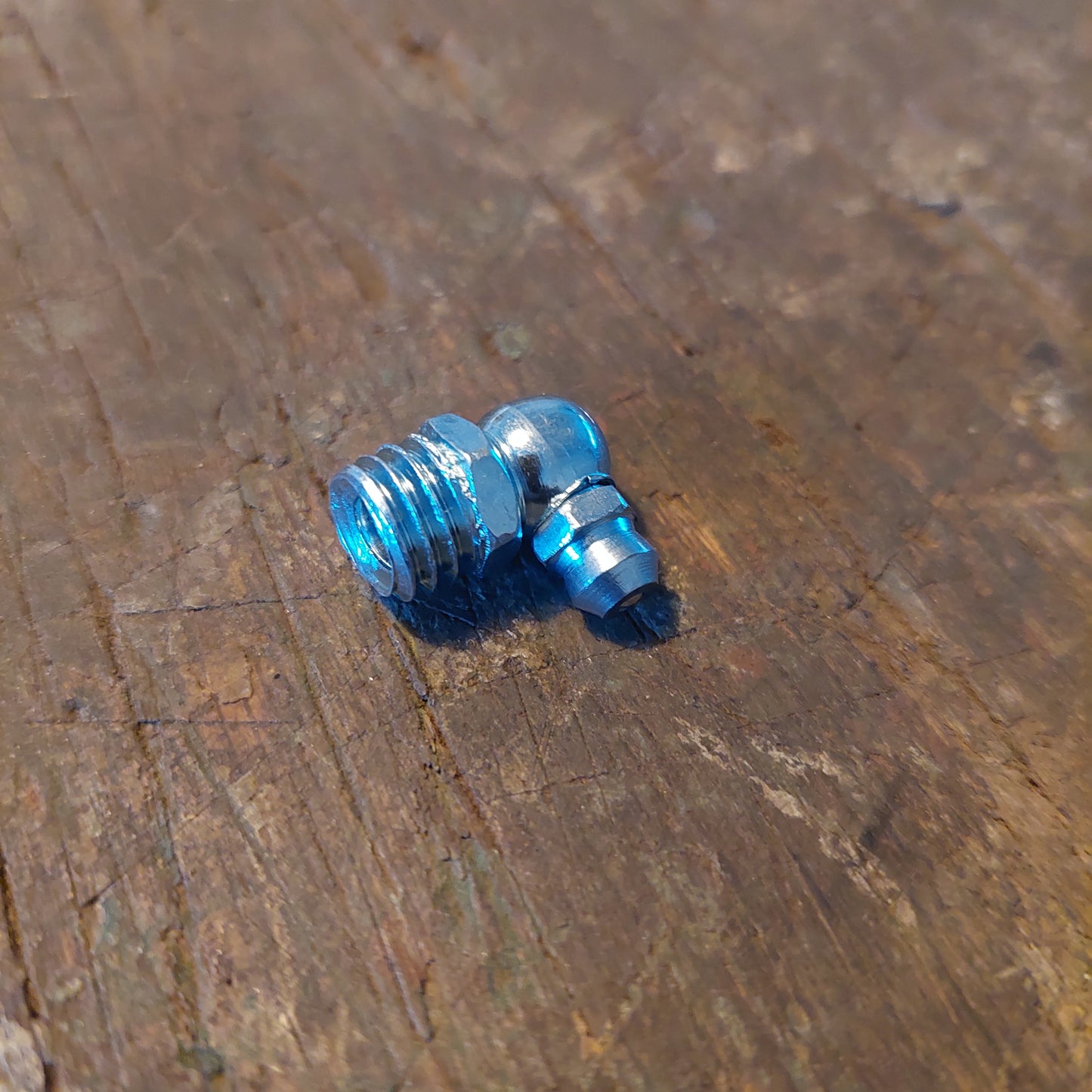 smeernippel M10x1.5 90graden