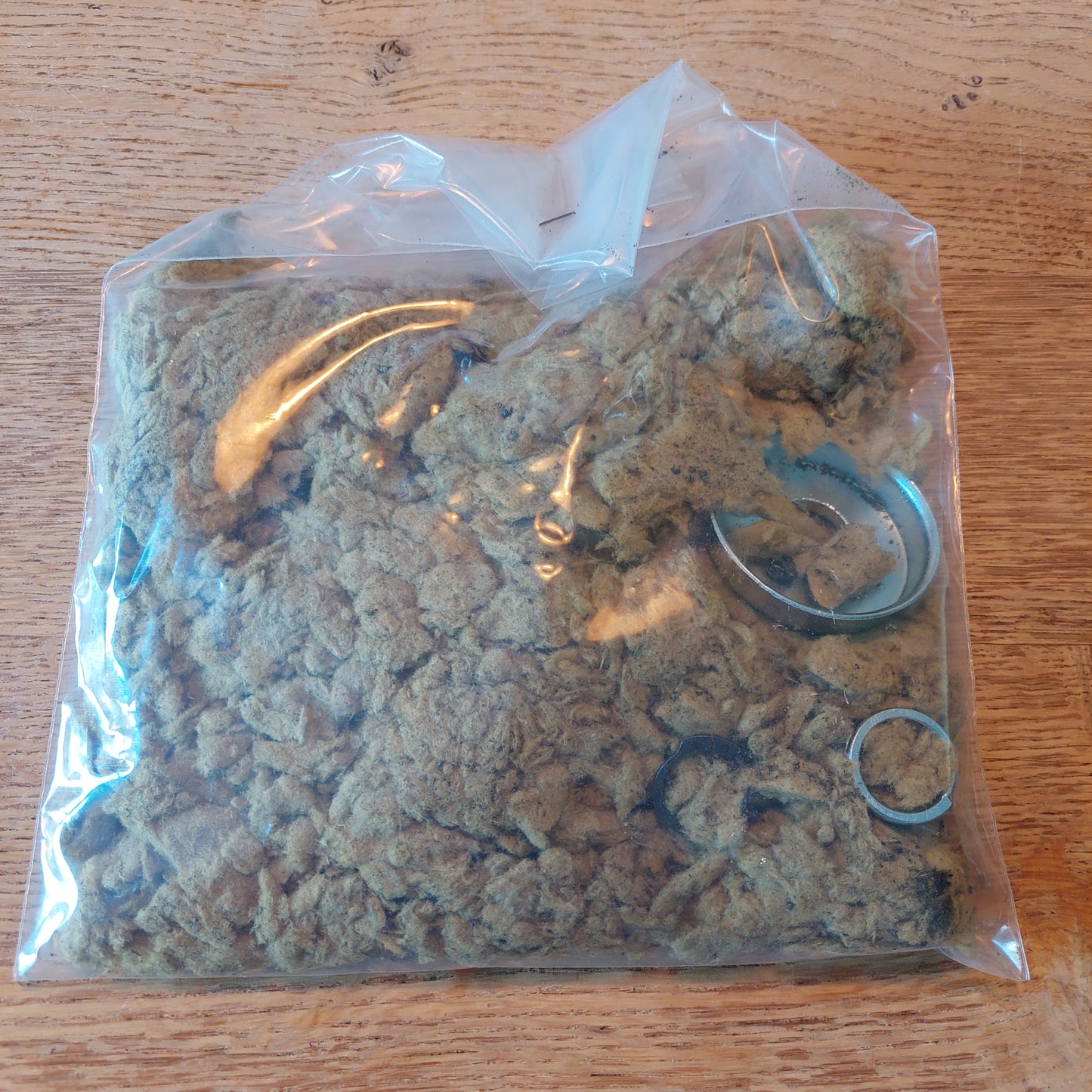 uitlaatdemper vulling wol